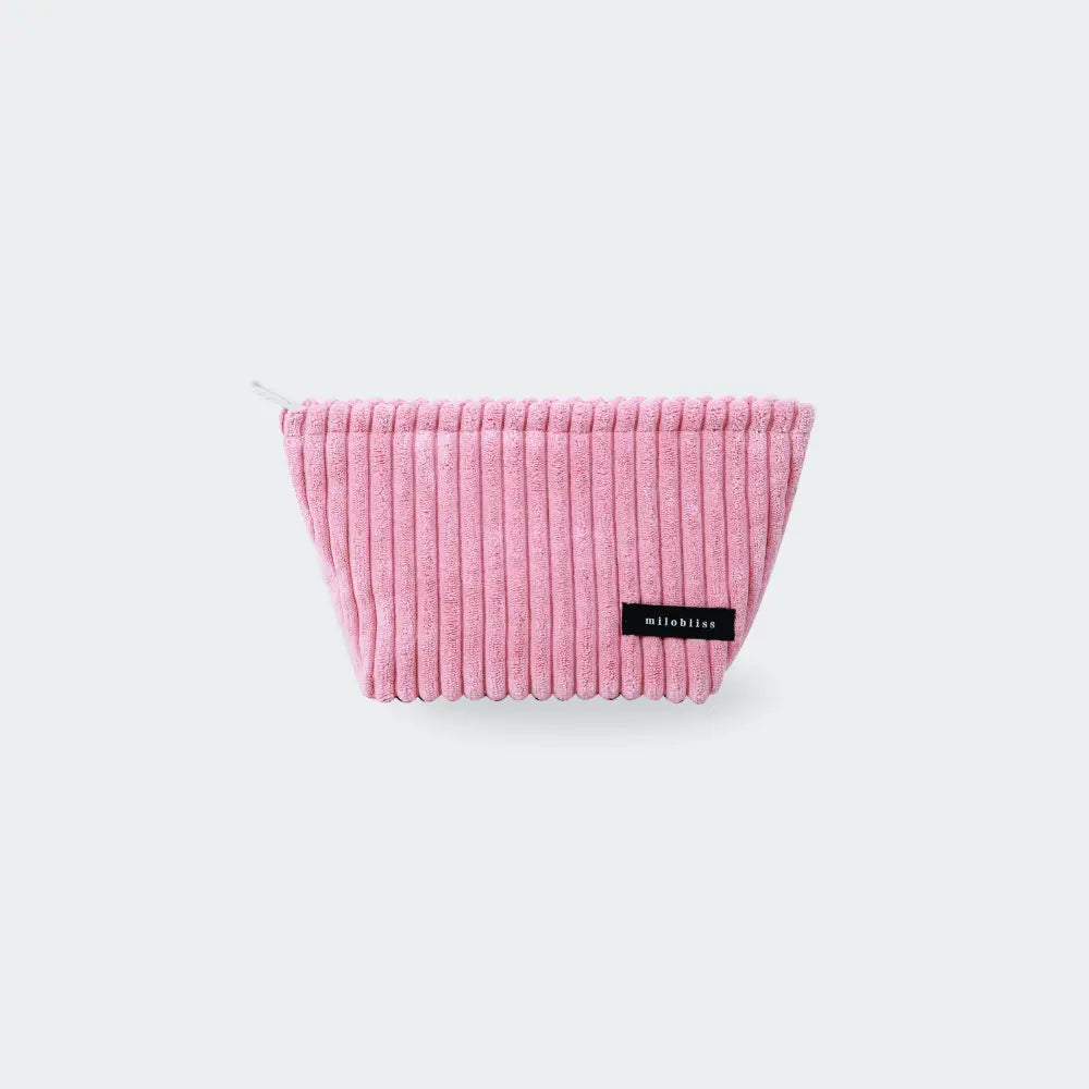 petite trousse de toilette velours côtelé rose fond blanc
