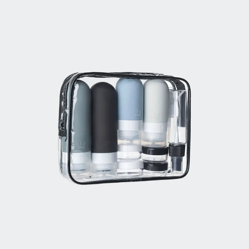 trousse de toilette avion transparente avec flacons et tubes de voyage