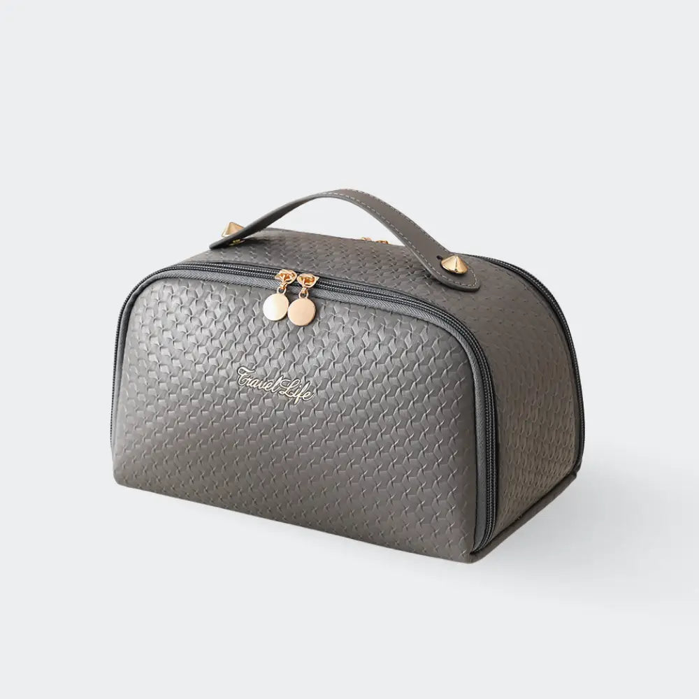 trousse de toilette femme luxe gris fond blanc