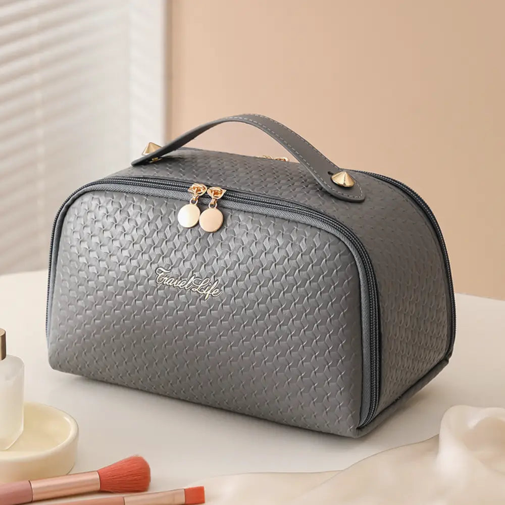 trousse de toilette femme luxe gris