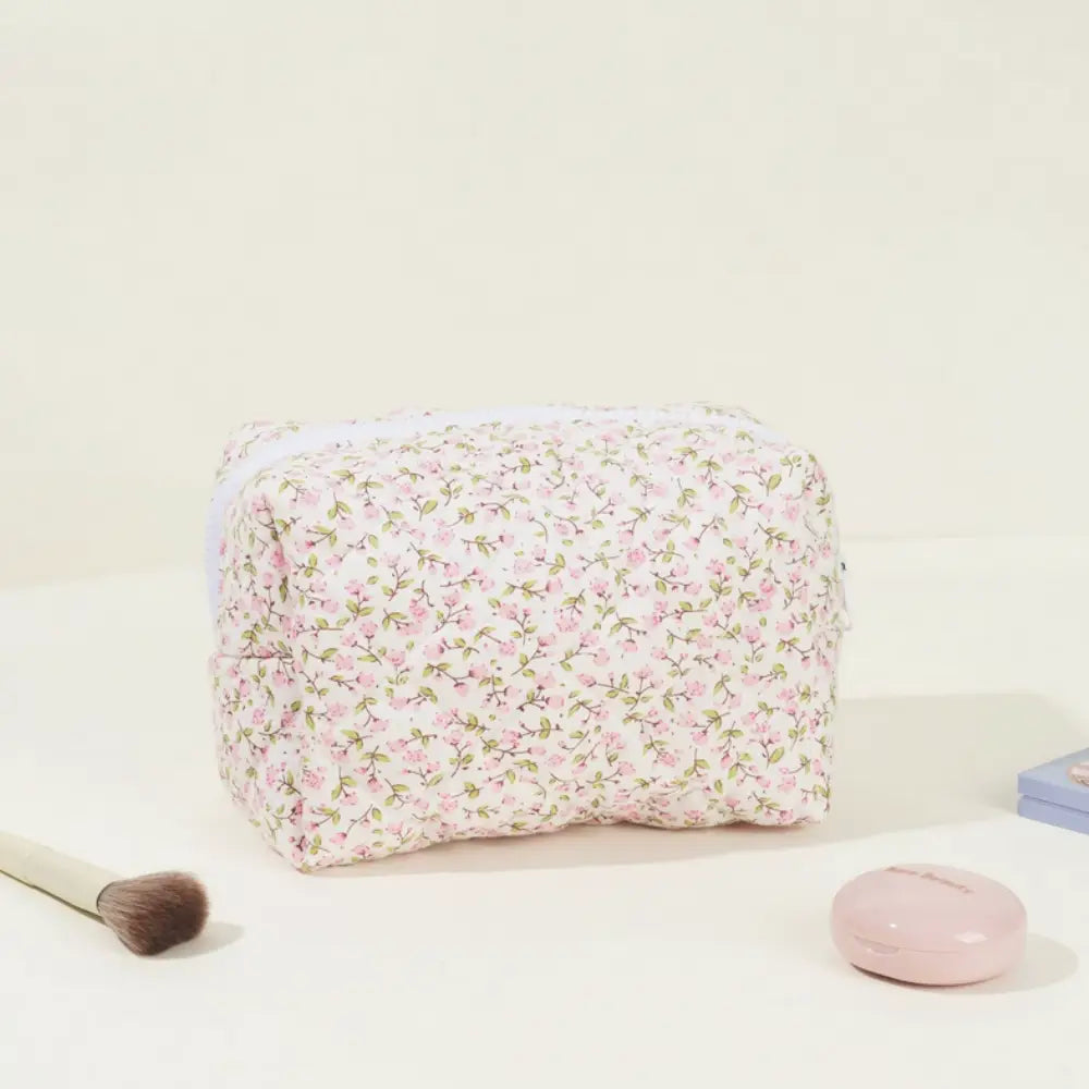 trousse de toilette fleurie rose Image