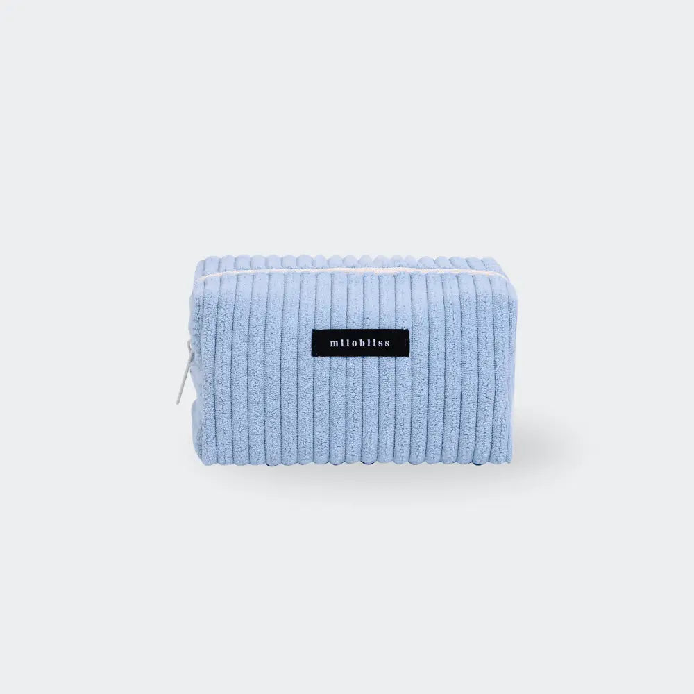 trousse de toilette velours côtelé bleu fond blanc Image